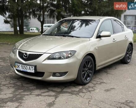 Бежевый Мазда 3, объемом двигателя 1.6 л и пробегом 220 тыс. км за 3499 $, фото 1 на Automoto.ua