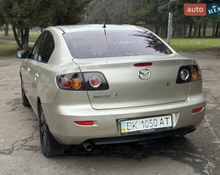 Бежевый Мазда 3, объемом двигателя 1.6 л и пробегом 220 тыс. км за 3499 $, фото 26 на Automoto.ua