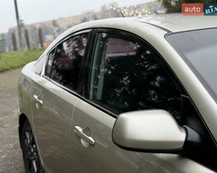 Бежевый Мазда 3, объемом двигателя 1.6 л и пробегом 220 тыс. км за 3499 $, фото 19 на Automoto.ua