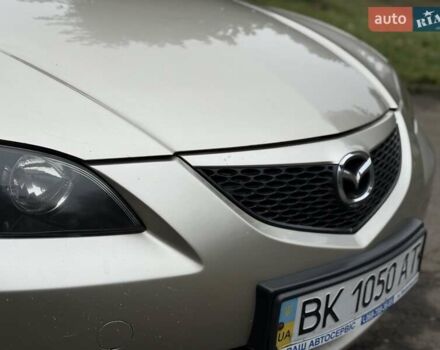 Бежевый Мазда 3, объемом двигателя 1.6 л и пробегом 220 тыс. км за 3499 $, фото 17 на Automoto.ua