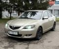 Бежевый Мазда 3, объемом двигателя 1.6 л и пробегом 220 тыс. км за 3499 $, фото 1 на Automoto.ua