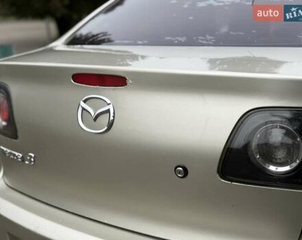 Бежевый Мазда 3, объемом двигателя 1.6 л и пробегом 220 тыс. км за 3499 $, фото 25 на Automoto.ua