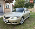 Бежевый Мазда 3, объемом двигателя 1.6 л и пробегом 306 тыс. км за 5100 $, фото 1 на Automoto.ua