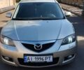 Бежевый Мазда 3, объемом двигателя 1.6 л и пробегом 189 тыс. км за 5500 $, фото 1 на Automoto.ua