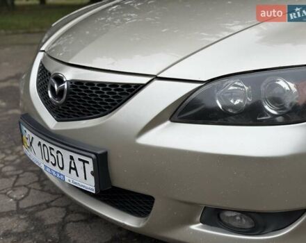 Бежевый Мазда 3, объемом двигателя 1.6 л и пробегом 220 тыс. км за 3499 $, фото 7 на Automoto.ua