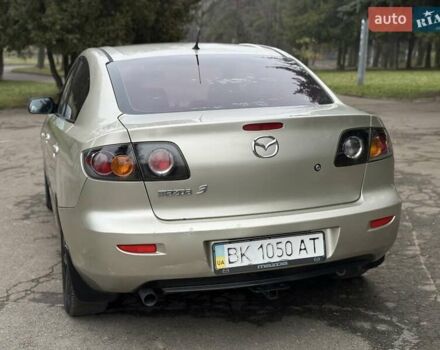 Бежевый Мазда 3, объемом двигателя 1.6 л и пробегом 220 тыс. км за 3499 $, фото 27 на Automoto.ua