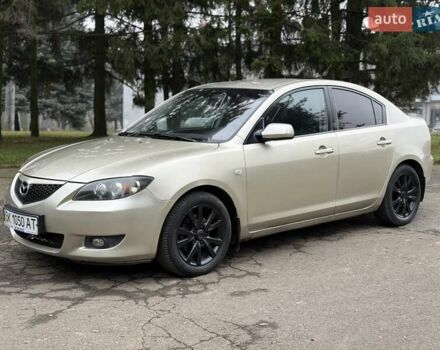 Бежевый Мазда 3, объемом двигателя 1.6 л и пробегом 220 тыс. км за 3499 $, фото 5 на Automoto.ua