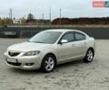 Бежевый Мазда 3, объемом двигателя 1.6 л и пробегом 236 тыс. км за 3450 $, фото 1 на Automoto.ua