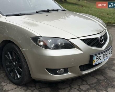 Бежевый Мазда 3, объемом двигателя 1.6 л и пробегом 220 тыс. км за 3499 $, фото 16 на Automoto.ua