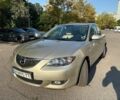 Бежевый Мазда 3, объемом двигателя 1.6 л и пробегом 154 тыс. км за 6399 $, фото 1 на Automoto.ua