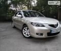 Бежевый Мазда 3, объемом двигателя 1.6 л и пробегом 232 тыс. км за 5700 $, фото 1 на Automoto.ua