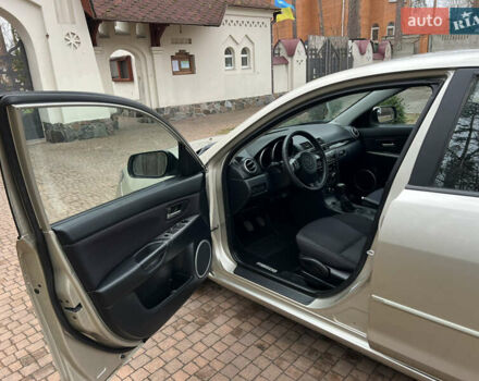 Бежевый Мазда 3, объемом двигателя 1.6 л и пробегом 174 тыс. км за 5600 $, фото 32 на Automoto.ua