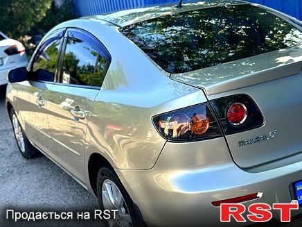 Бежевый Мазда 3, объемом двигателя 1.6 л и пробегом 226 тыс. км за 5600 $, фото 3 на Automoto.ua