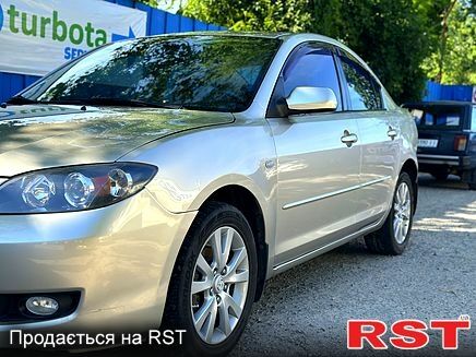 Бежевый Мазда 3, объемом двигателя 1.6 л и пробегом 226 тыс. км за 5600 $, фото 1 на Automoto.ua