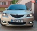 Бежевый Мазда 3, объемом двигателя 1.6 л и пробегом 280 тыс. км за 4650 $, фото 1 на Automoto.ua
