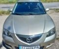 Бежевый Мазда 3, объемом двигателя 1.6 л и пробегом 282 тыс. км за 4100 $, фото 1 на Automoto.ua