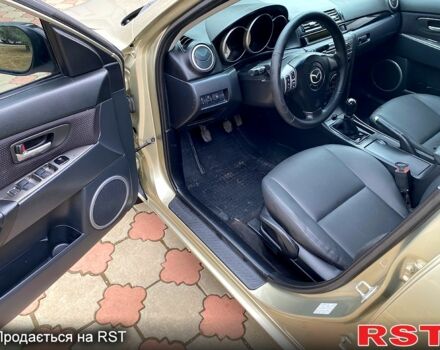 Бежевый Мазда 3, объемом двигателя 1.6 л и пробегом 178 тыс. км за 5200 $, фото 3 на Automoto.ua