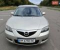 Бежевый Мазда 3, объемом двигателя 2 л и пробегом 170 тыс. км за 5700 $, фото 2 на Automoto.ua
