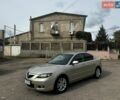Бежевый Мазда 3, объемом двигателя 1.6 л и пробегом 152 тыс. км за 5950 $, фото 1 на Automoto.ua