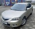 Бежевый Мазда 3, объемом двигателя 1.6 л и пробегом 236 тыс. км за 5595 $, фото 1 на Automoto.ua