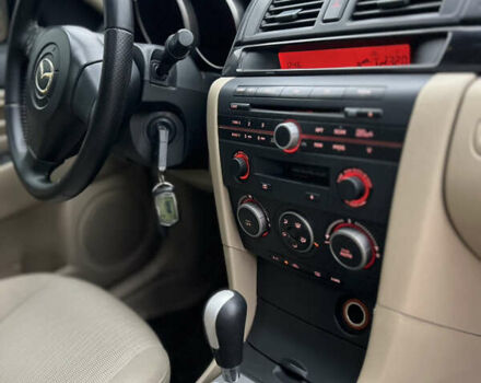 Бежевый Мазда 3, объемом двигателя 1.6 л и пробегом 135 тыс. км за 5199 $, фото 48 на Automoto.ua