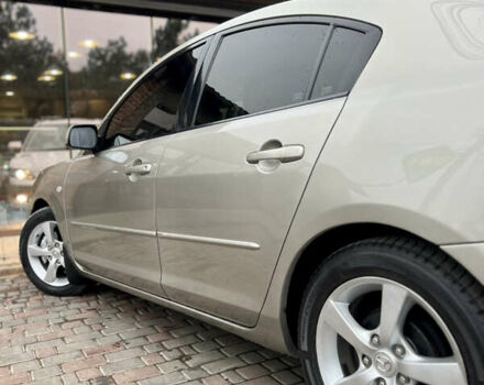 Бежевый Мазда 3, объемом двигателя 1.6 л и пробегом 135 тыс. км за 5199 $, фото 30 на Automoto.ua