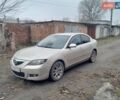Бежевий Мазда 3, об'ємом двигуна 1.6 л та пробігом 200 тис. км за 4500 $, фото 1 на Automoto.ua