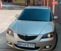 Бежевый Мазда 3, объемом двигателя 1.6 л и пробегом 280 тыс. км за 4650 $, фото 1 на Automoto.ua
