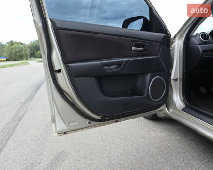 Бежевый Мазда 3, объемом двигателя 2 л и пробегом 170 тыс. км за 5700 $, фото 10 на Automoto.ua