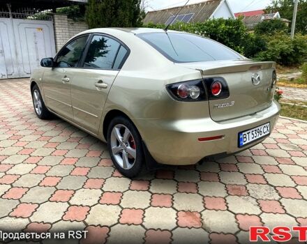 Бежевый Мазда 3, объемом двигателя 1.6 л и пробегом 178 тыс. км за 5200 $, фото 1 на Automoto.ua