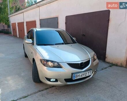 Бежевый Мазда 3, объемом двигателя 1.6 л и пробегом 280 тыс. км за 4999 $, фото 6 на Automoto.ua