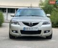 Бежевый Мазда 3, объемом двигателя 1.6 л и пробегом 170 тыс. км за 5800 $, фото 1 на Automoto.ua