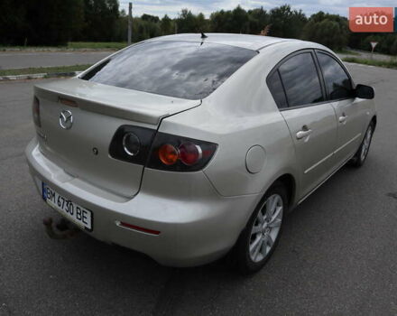 Бежевый Мазда 3, объемом двигателя 2 л и пробегом 170 тыс. км за 5700 $, фото 5 на Automoto.ua