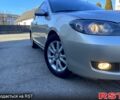 Бежевий Мазда 3, об'ємом двигуна 1.6 л та пробігом 247 тис. км за 4999 $, фото 1 на Automoto.ua