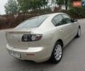 Бежевий Мазда 3, об'ємом двигуна 2 л та пробігом 32 тис. км за 8800 $, фото 4 на Automoto.ua