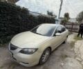Бежевий Мазда 3, об'ємом двигуна 1.6 л та пробігом 310 тис. км за 2610 $, фото 1 на Automoto.ua