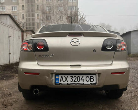 Бежевый Мазда 3, объемом двигателя 2 л и пробегом 147 тыс. км за 5000 $, фото 5 на Automoto.ua