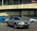 Бежевий Мазда 3, об'ємом двигуна 1.6 л та пробігом 295 тис. км за 5990 $, фото 1 на Automoto.ua