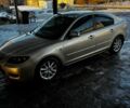 Бежевий Мазда 3, об'ємом двигуна 2 л та пробігом 223 тис. км за 5600 $, фото 1 на Automoto.ua