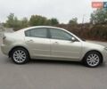 Бежевий Мазда 3, об'ємом двигуна 2 л та пробігом 32 тис. км за 8800 $, фото 5 на Automoto.ua