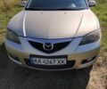 Бежевий Мазда 3, об'ємом двигуна 1.6 л та пробігом 290 тис. км за 4980 $, фото 1 на Automoto.ua