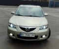 Бежевый Мазда 3, объемом двигателя 1.6 л и пробегом 119 тыс. км за 7000 $, фото 1 на Automoto.ua