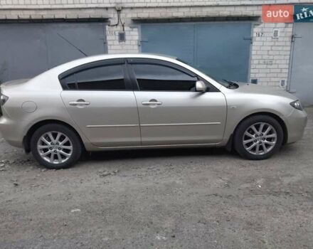 Бежевий Мазда 3, об'ємом двигуна 1.6 л та пробігом 112 тис. км за 7000 $, фото 1 на Automoto.ua