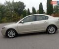 Бежевий Мазда 3, об'ємом двигуна 2 л та пробігом 32 тис. км за 8800 $, фото 1 на Automoto.ua