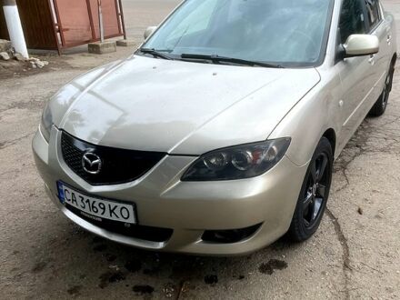 Бежевый Мазда 3, объемом двигателя 1.6 л и пробегом 230 тыс. км за 4300 $, фото 1 на Automoto.ua
