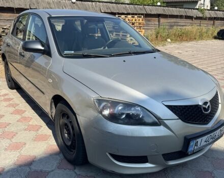 Бежевый Мазда 3, объемом двигателя 1.3 л и пробегом 221 тыс. км за 2900 $, фото 1 на Automoto.ua