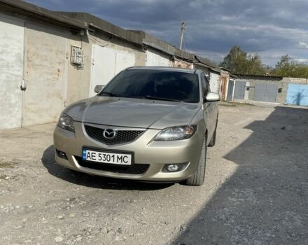 Бежевый Мазда 3, объемом двигателя 2 л и пробегом 320 тыс. км за 4300 $, фото 1 на Automoto.ua