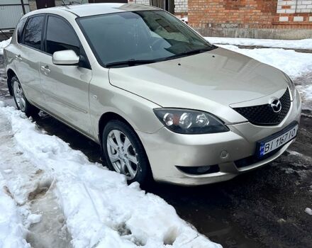 Бежевый Мазда 3, объемом двигателя 1.6 л и пробегом 244 тыс. км за 4650 $, фото 1 на Automoto.ua