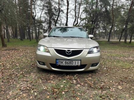 Бежевий Мазда 3, об'ємом двигуна 1.6 л та пробігом 252 тис. км за 4000 $, фото 1 на Automoto.ua