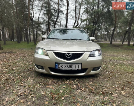 Бежевый Мазда 3, объемом двигателя 1.6 л и пробегом 252 тыс. км за 4000 $, фото 1 на Automoto.ua